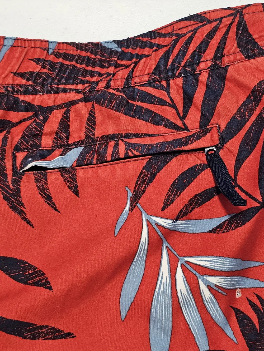 Nautica Red Swim Shorts with Black and Light Blue Tropical Leaf Print Large